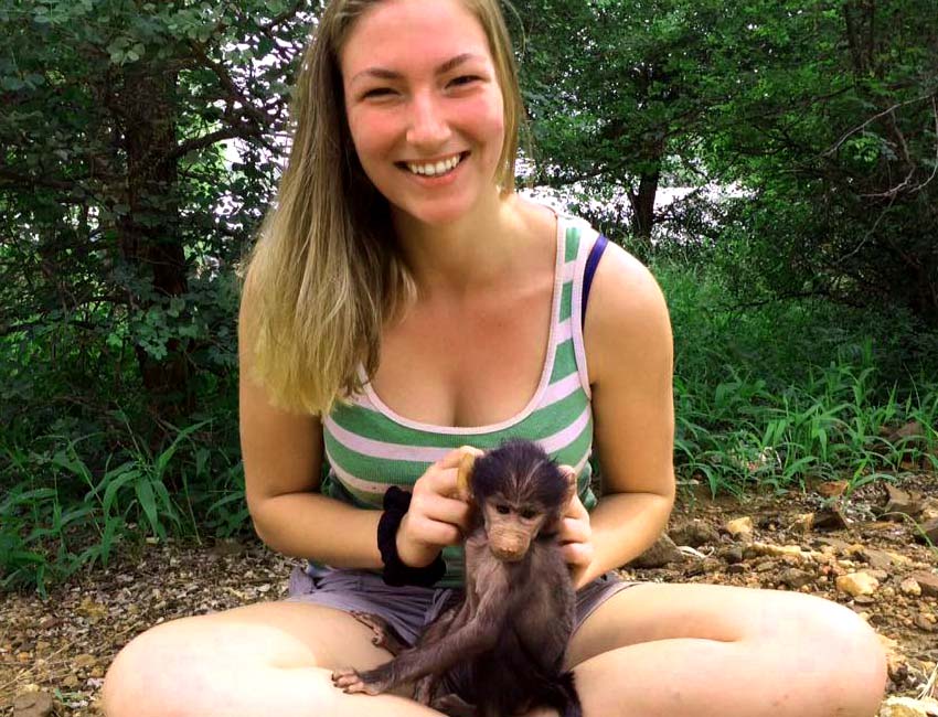 Cross-legged Girl with Baboon